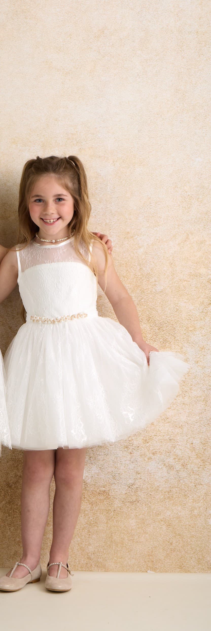 Lace dress in soft cream.